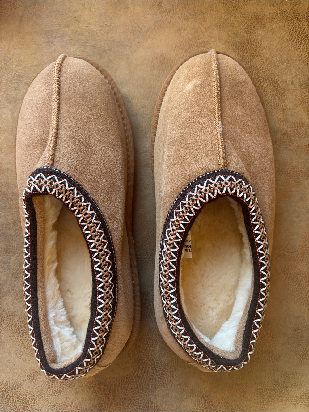 UGG Tasman Slippers in the Chestnut colorway, size 8.5